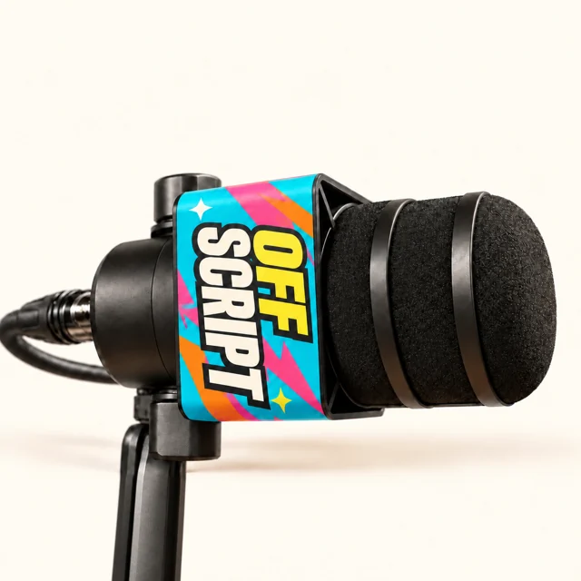 Colorful custom mic flag fitted to a RØDE PodMic XLR with a WS14 windscreen